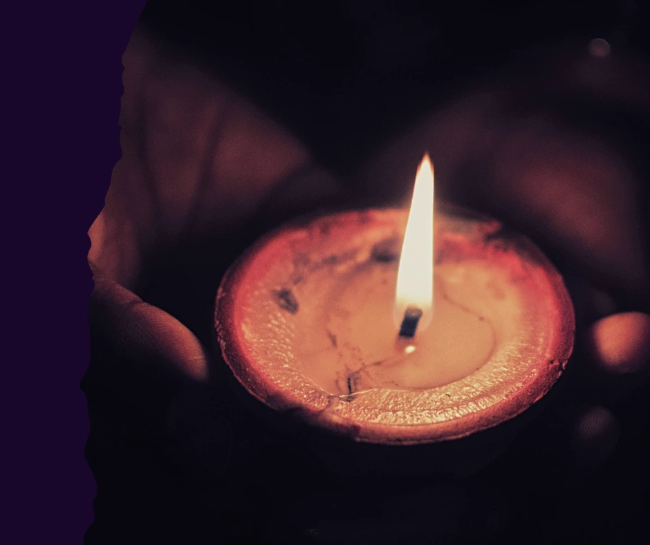 Candle light hold by 2 hands